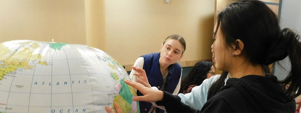 Students Studying Globe